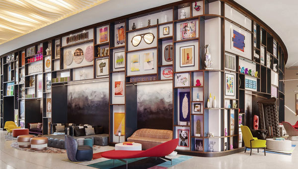 Contemporary art fills the gallery wall of the entire lobby at the Lake Nona Wave Hotel.