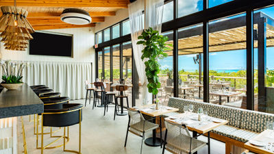 The Marine Room menu, curated by executive chef Dennis Omega, features a fusion of Caribbean coastal flavors and Mediterranean techniques with an emphasis on fresh seafood and locally sourced ingredients.