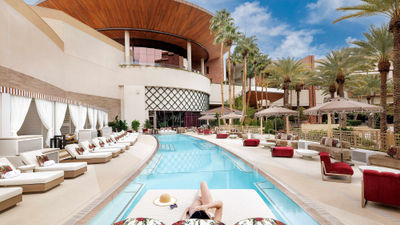 The Rouge Room, an upscale, adults-only poolside experience at Red Rock Resort. The area features eight cabanas, several lounge-style seating options, a variety of culinary fare and a dedicated outdoor bar with live DJ entertainment.